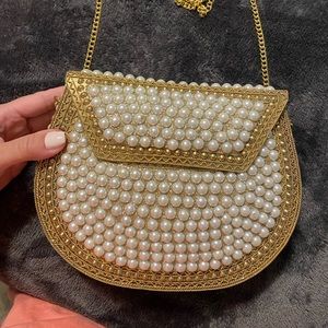 From st. xavier pearl bag